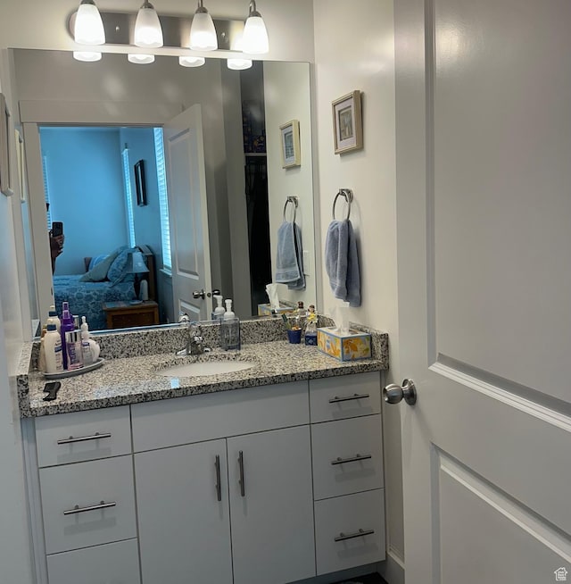 470 W 15 S Unit F201, Providence, UT 84332 - ensuite bathroom featuring vanity