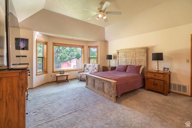 4163 S Beeman Rd, Moab, UT 84532 - bedroom with light colored carpet, vaulted ceiling, and ceiling fan