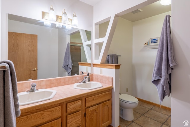 4163 S Beeman Rd, Moab, UT 84532 - full bathroom featuring double vanity, tile patterned flooring, and a shower