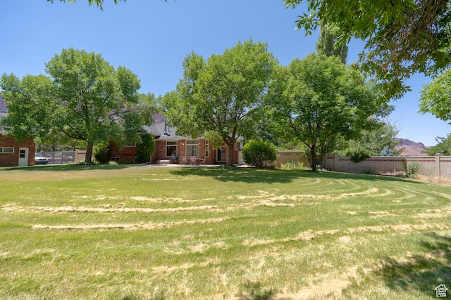 4163 S Beeman Rd, Moab, UT 84532 - view of yard featuring a patio area