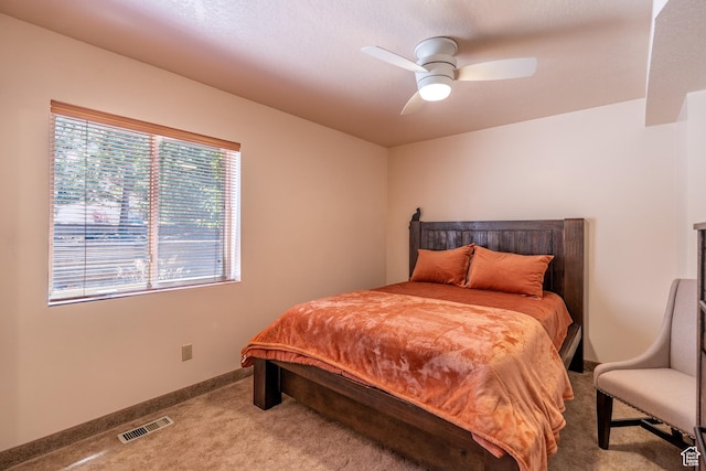 4163 S Beeman Rd, Moab, UT 84532 - bedroom featuring carpet and a ceiling fan