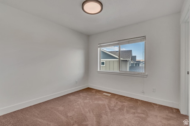 8069 N Quarter Mile Dr, Eagle Mountain, UT 84005 - carpeted spare room with baseboards
