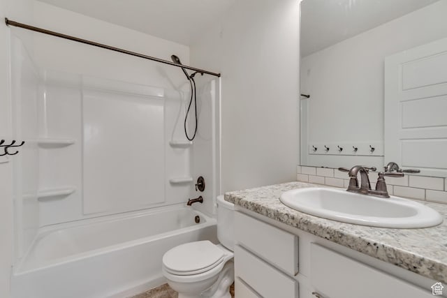 8069 N Quarter Mile Dr, Eagle Mountain, UT 84005 - bathroom featuring vanity, backsplash, and washtub / shower combination