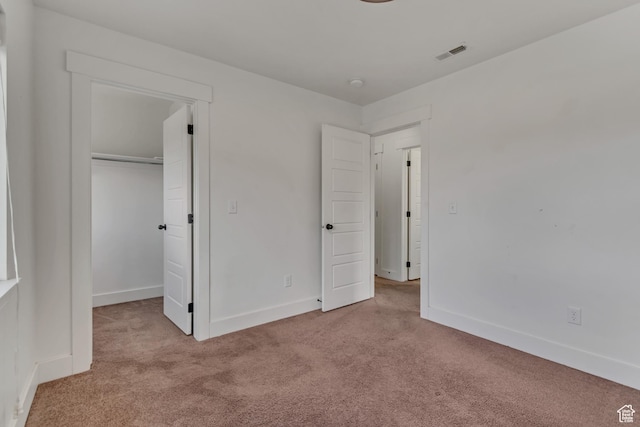 8069 N Quarter Mile Dr, Eagle Mountain, UT 84005 - unfurnished bedroom featuring carpet floors, a closet, and a spacious closet