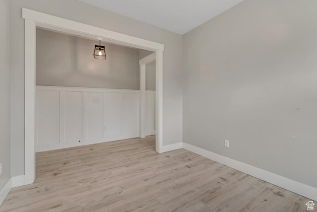 8069 N Quarter Mile Dr, Eagle Mountain, UT 84005 - empty room featuring light wood-type flooring