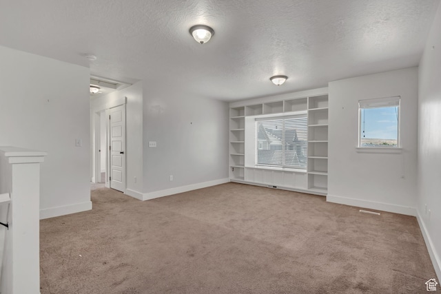 8069 N Quarter Mile Dr, Eagle Mountain, UT 84005 - unfurnished room featuring a textured ceiling and light carpet