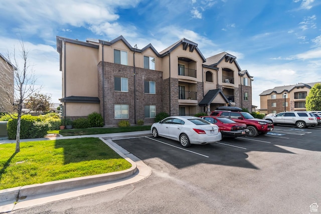 1045 S 1700 W Unit 1213, Payson, UT 84651 - view of building exterior featuring uncovered parking