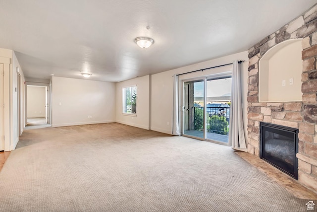 1045 S 1700 W Unit 1213, Payson, UT 84651 - unfurnished living room with a fireplace and carpet