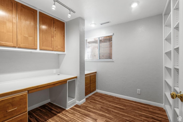 1870 E Monterey Dr, Salt Lake City, UT 84121 - unfurnished office with built in desk, dark wood-style flooring, and rail lighting