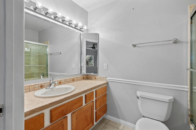 1870 E Monterey Dr, Salt Lake City, UT 84121 - full bathroom featuring a shower with shower door, vanity, tile patterned floors, a ceiling fan, and backsplash