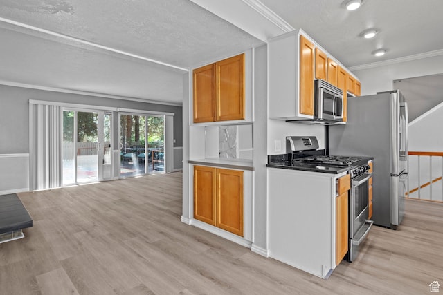 1870 E Monterey Dr, Salt Lake City, UT 84121 - kitchen featuring appliances with stainless steel finishes, light wood-type flooring, crown molding, open floor plan, and a textured ceiling
