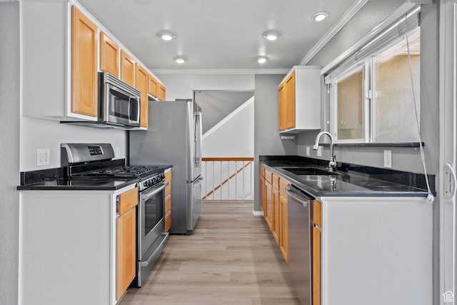 1870 E Monterey Dr, Salt Lake City, UT 84121 - kitchen with appliances with stainless steel finishes, crown molding, and light wood-style flooring