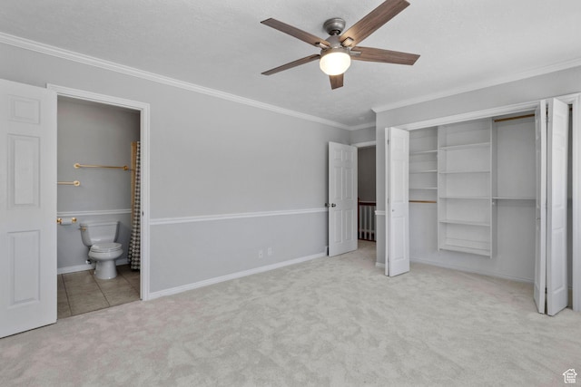 1870 E Monterey Dr, Salt Lake City, UT 84121 - unfurnished bedroom with carpet flooring, crown molding, ensuite bath, a ceiling fan, and a closet