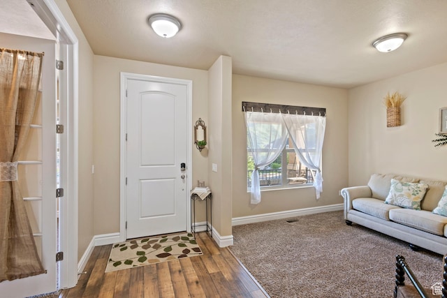 6284 Oak Ridge Ln, Mountain Green, UT 84050 - entryway featuring wood finished floors and baseboards