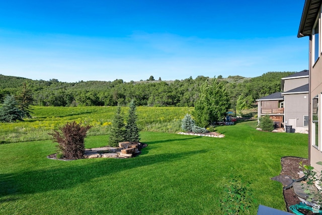 6284 Oak Ridge Ln, Mountain Green, UT 84050 - view of grassy yard with a view of trees