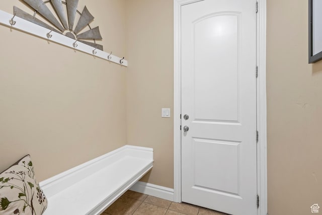 6284 Oak Ridge Ln, Mountain Green, UT 84050 - mudroom with light tile patterned flooring and baseboards