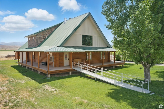 265 S 400 E, Centerfield, UT 84622 - rear view of house featuring covered porch, a yard, and a metal roof
