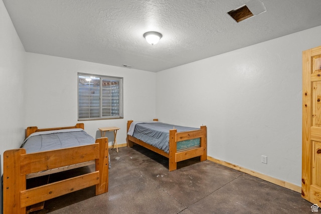 265 S 400 E, Centerfield, UT 84622 - bedroom with concrete floors and a textured ceiling