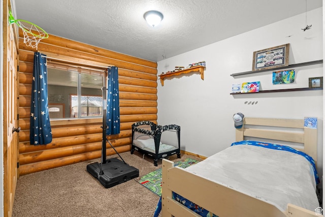 265 S 400 E, Centerfield, UT 84622 - bedroom featuring log walls, a textured ceiling, and carpet flooring