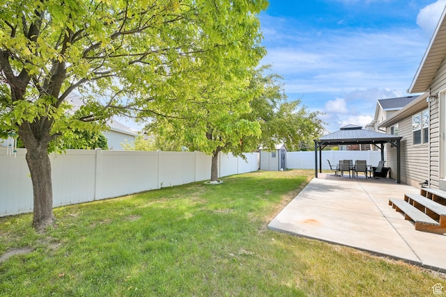 5057 W Eagle Rock Way, West Valley City, UT 84120 - fenced backyard featuring a gazebo, a patio area, and a shed