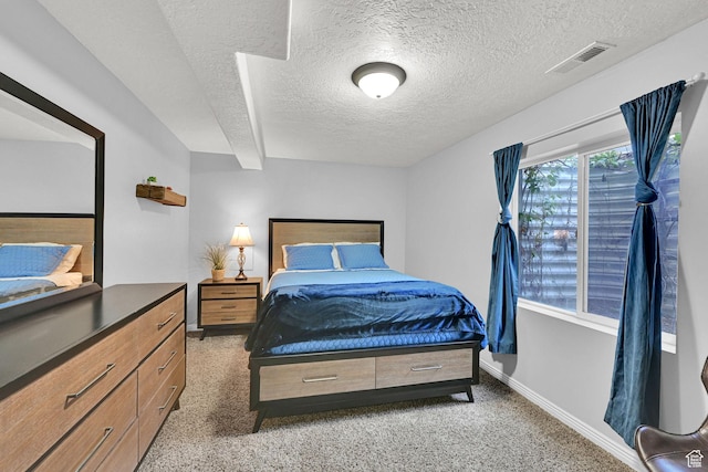 5057 W Eagle Rock Way, West Valley City, UT 84120 - bedroom featuring a textured ceiling and light carpet
