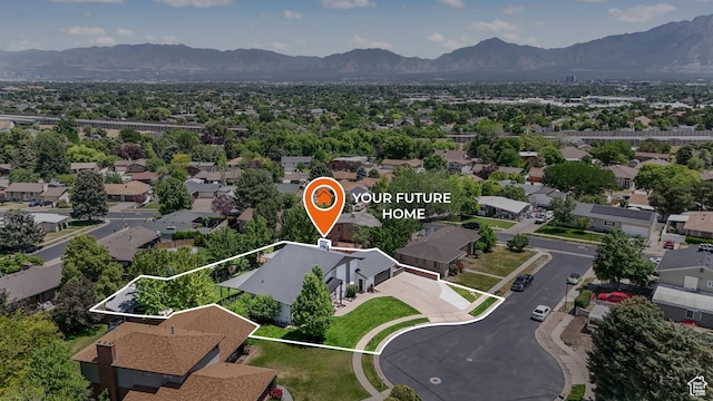 2550 W Lolene Cir, Taylorsville, UT 84129 - aerial perspective of suburban area featuring a mountain backdrop and property parcel outlined