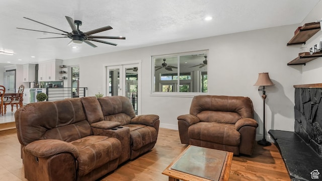 2550 W Lolene Cir, Taylorsville, UT 84129 - living room featuring ceiling fan, light wood-style floors, and recessed lighting