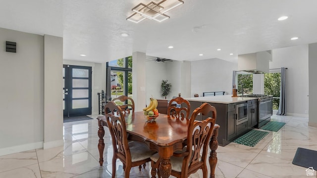 2550 W Lolene Cir, Taylorsville, UT 84129 - dining space with recessed lighting, light marble finish floors, and ceiling fan