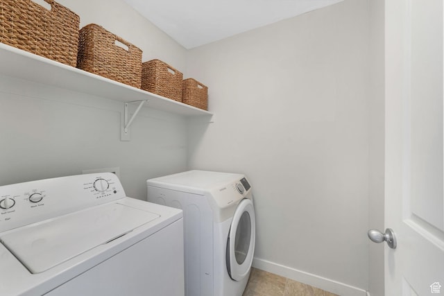 5124 W Stockfield Ln, Herriman, UT 84096 - laundry room with separate washer and dryer and baseboards