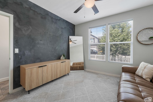 5124 W Stockfield Ln, Herriman, UT 84096 - living room featuring a ceiling fan, light carpet, and an accent wall
