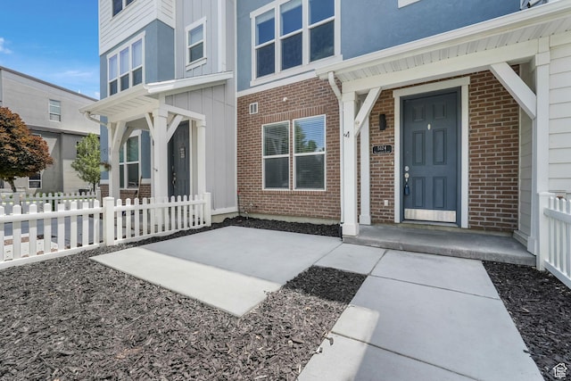 5124 W Stockfield Ln, Herriman, UT 84096 - entrance to property with brick siding and board and batten siding