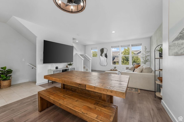 5124 W Stockfield Ln, Herriman, UT 84096 - dining room with stairs, wood finished floors, recessed lighting, and a chandelier