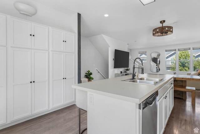 5124 W Stockfield Ln, Herriman, UT 84096 - kitchen featuring dishwasher, open floor plan, white cabinetry, wood finished floors, and light countertops