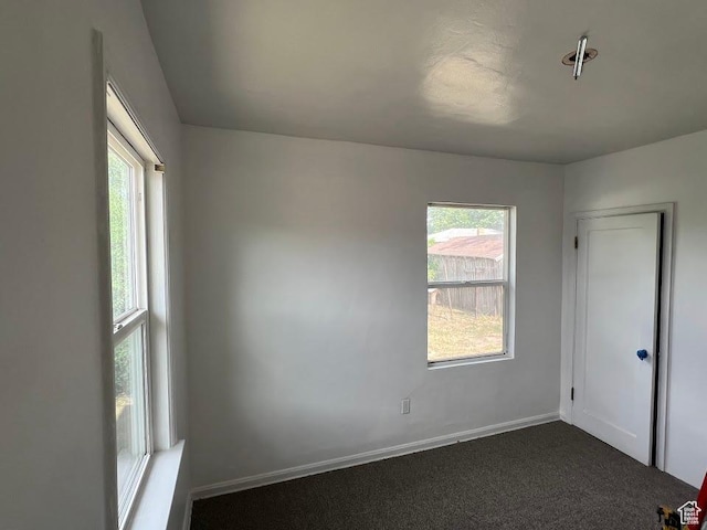 2859 S 9000 W, Magna, UT 84044 - empty room with dark carpet and baseboards