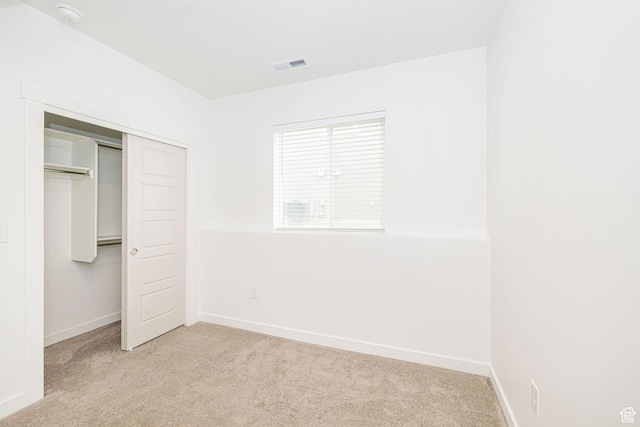 425 W Domain Ln, Grantsville, UT 84029 - unfurnished bedroom featuring light carpet and a closet