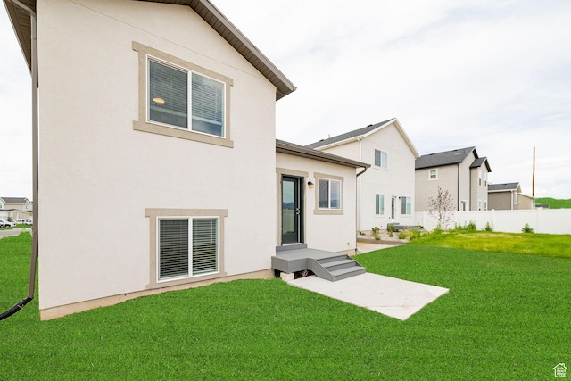 425 W Domain Ln, Grantsville, UT 84029 - rear view of property featuring stucco siding
