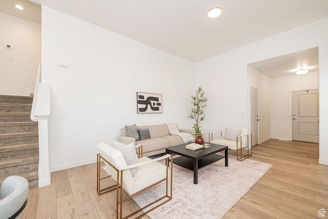 425 W Domain Ln, Grantsville, UT 84029 - living room featuring light wood finished floors, stairs, and recessed lighting