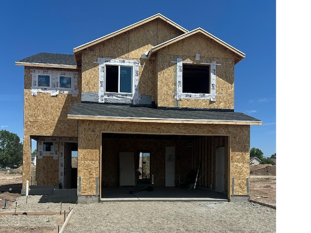 2174 W 2615 N Unit 138, Clinton, UT 84015 - rear view of house featuring a garage and roof with shingles