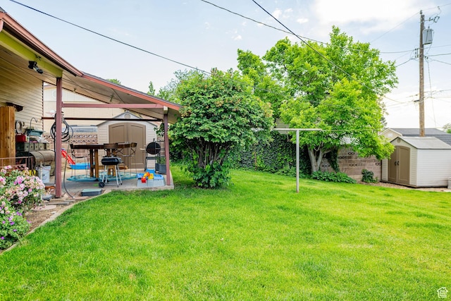 1630 S 100 E, Bountiful, UT 84010 - fenced backyard featuring a storage unit and a patio