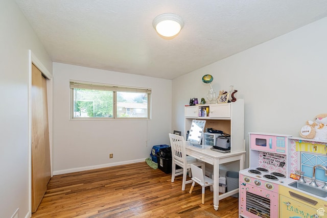 1630 S 100 E, Bountiful, UT 84010 - office space featuring light wood-style flooring and a textured ceiling