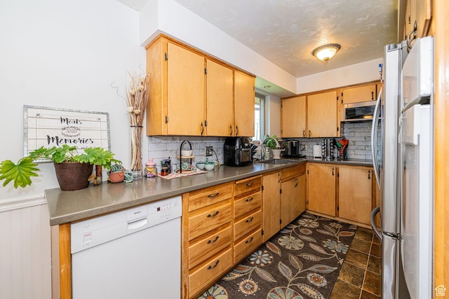 1630 S 100 E, Bountiful, UT 84010 - kitchen with appliances with stainless steel finishes, tasteful backsplash, a wainscoted wall, and dark countertops