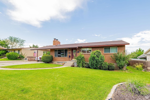 1630 S 100 E, Bountiful, UT 84010 - single story home featuring brick siding, a chimney, and driveway