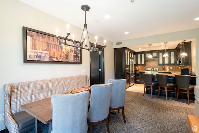 2100 W Frostwood Blvd Unit 4175, Park City, UT 84098 - dining space with a chandelier, recessed lighting, and light carpet