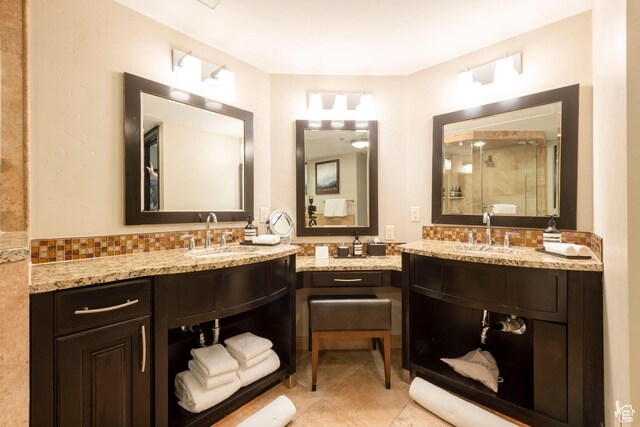 2100 W Frostwood Blvd Unit 4175, Park City, UT 84098 - full bathroom featuring a shower stall, tile patterned flooring, vanity, and decorative backsplash