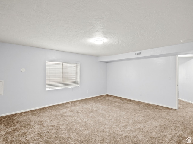517 E 1140 S, Roosevelt, UT 84066 - carpeted empty room with a textured ceiling and baseboards