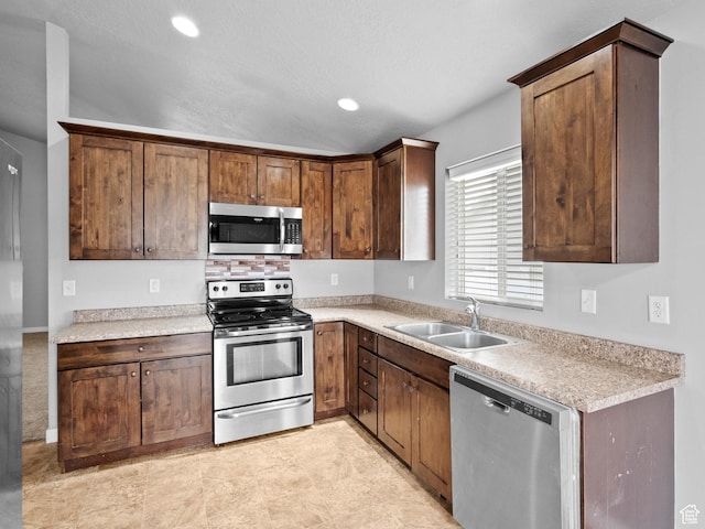 517 E 1140 S, Roosevelt, UT 84066 - kitchen with stainless steel appliances, light countertops, and recessed lighting