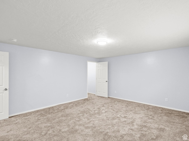 517 E 1140 S, Roosevelt, UT 84066 - empty room with carpet, a textured ceiling, and a smoke detector