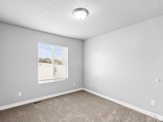 517 E 1140 S, Roosevelt, UT 84066 - carpeted spare room with a textured ceiling and baseboards