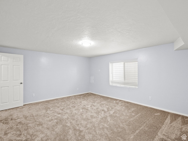 517 E 1140 S, Roosevelt, UT 84066 - unfurnished room with carpet floors and a textured ceiling