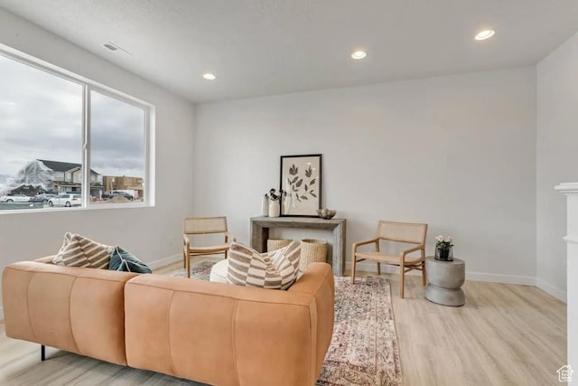 2198 W 2615 N Unit 140, Clinton, UT 84015 - living room featuring wood finished floors and recessed lighting